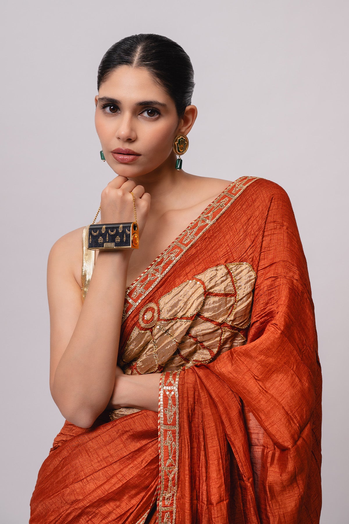 Rust Windrose Crushed Saree with Batua Lipstick